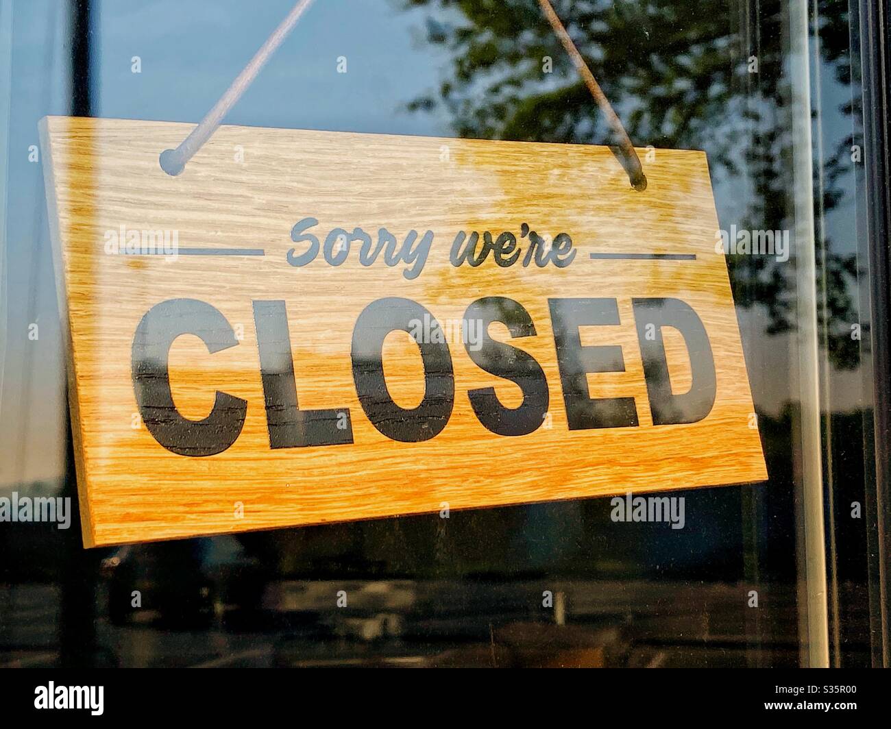 Closed sign on shop door Stock Photo