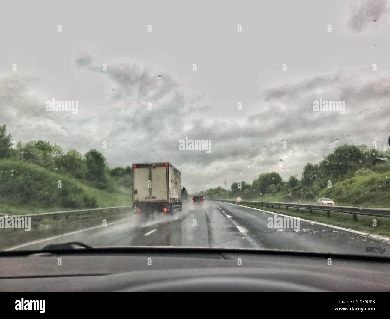 Motorway in the rain Stock Photo