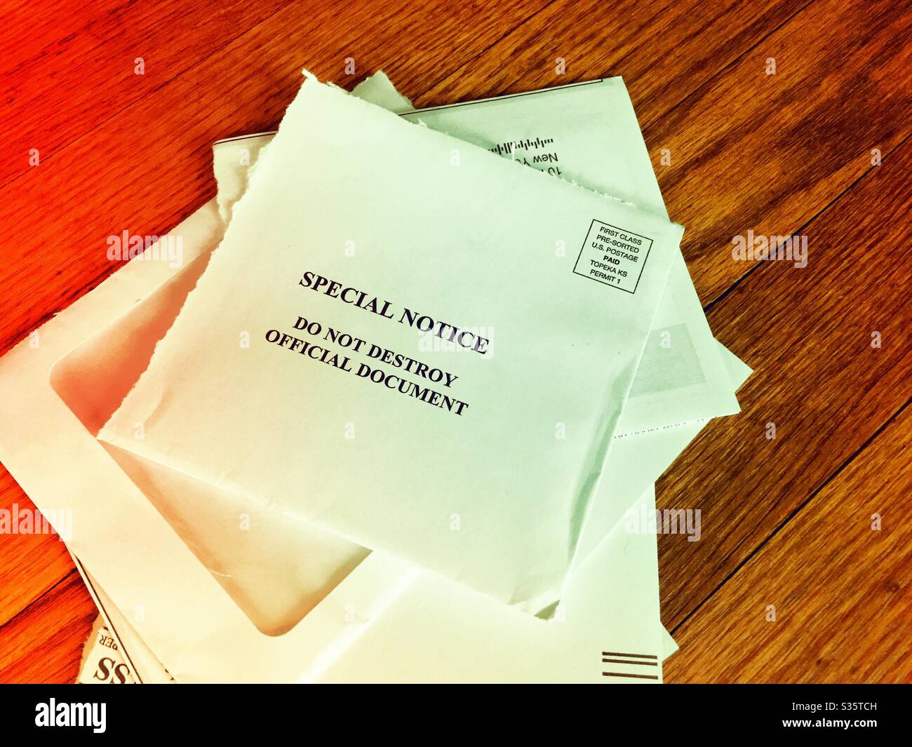 Official document mailing torn into, USA - Smartphone Captured Stock Image