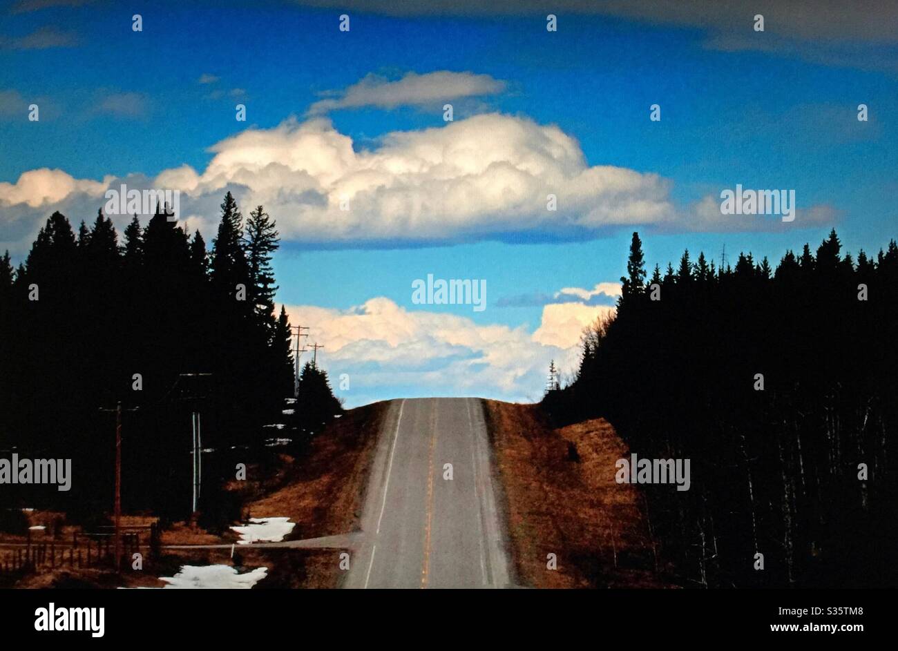 Country road, blue sky, white clouds, beautiful day - Smartphone Captured Stock Image