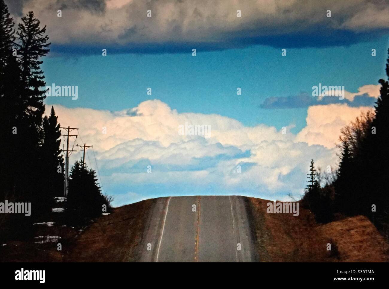 Country road, blue sky, white clouds, beautiful evening - Smartphone Captured Stock Image