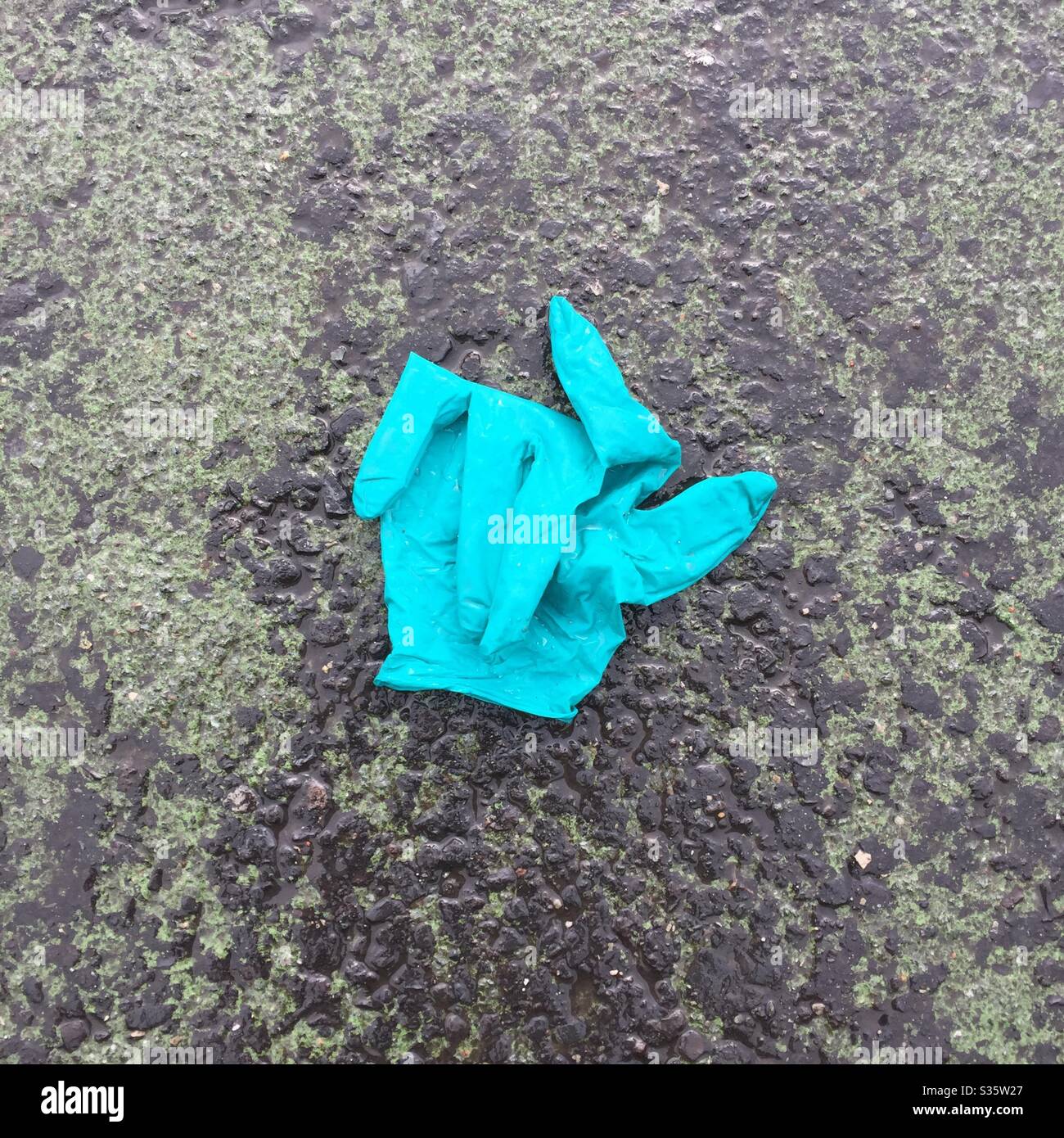 Discarded surgical glove - Smartphone Captured Stock Image