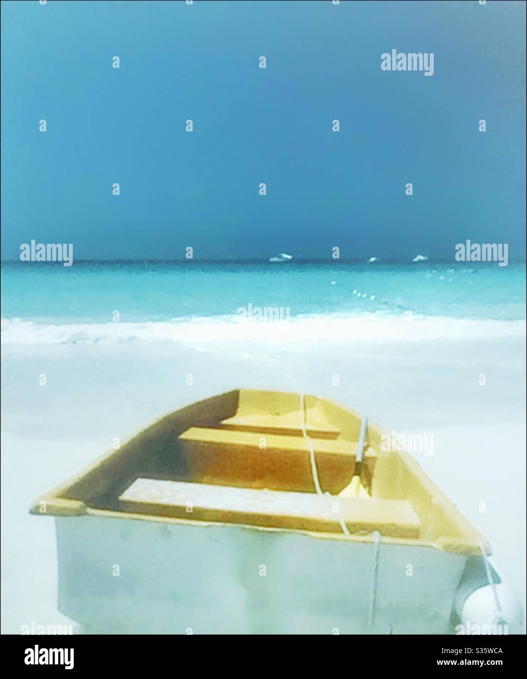 A boat lying on a beach Stock Photo - Alamy