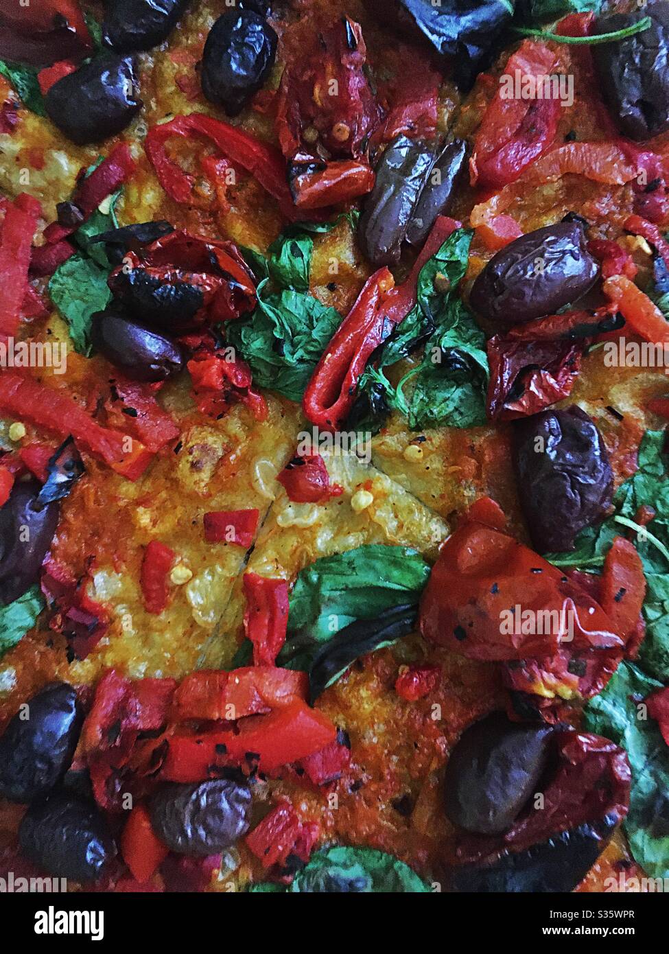Close up of a Colourful vegan pizza. Vegan food - Smartphone Captured Stock Image