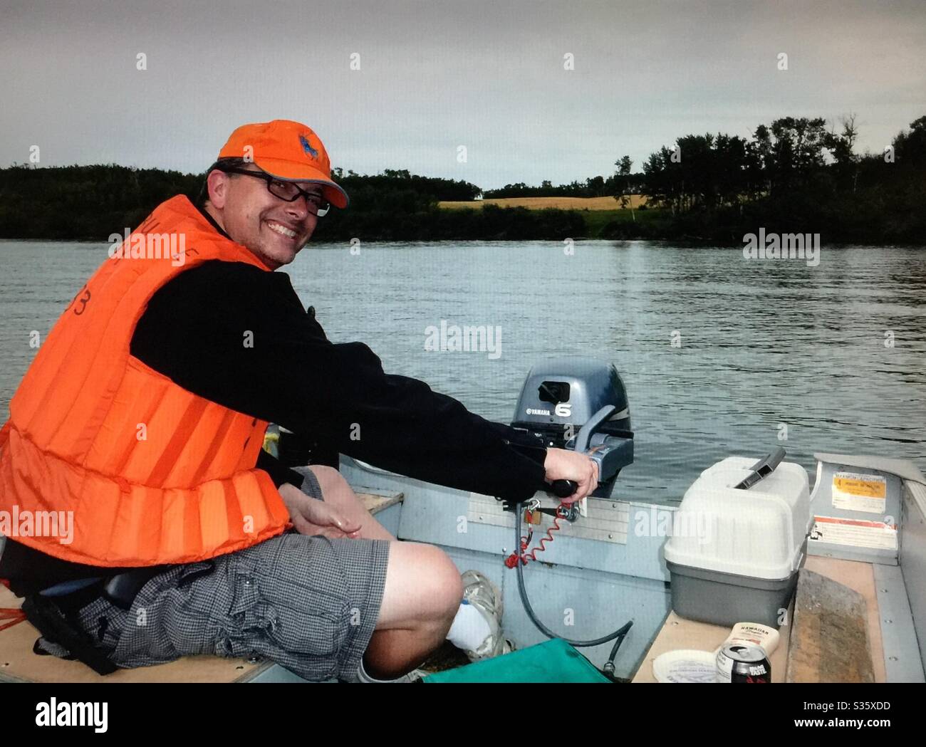 Family fun, Fishing on Pine Lake , Alberta, Canada, - Smartphone Captured Stock Image