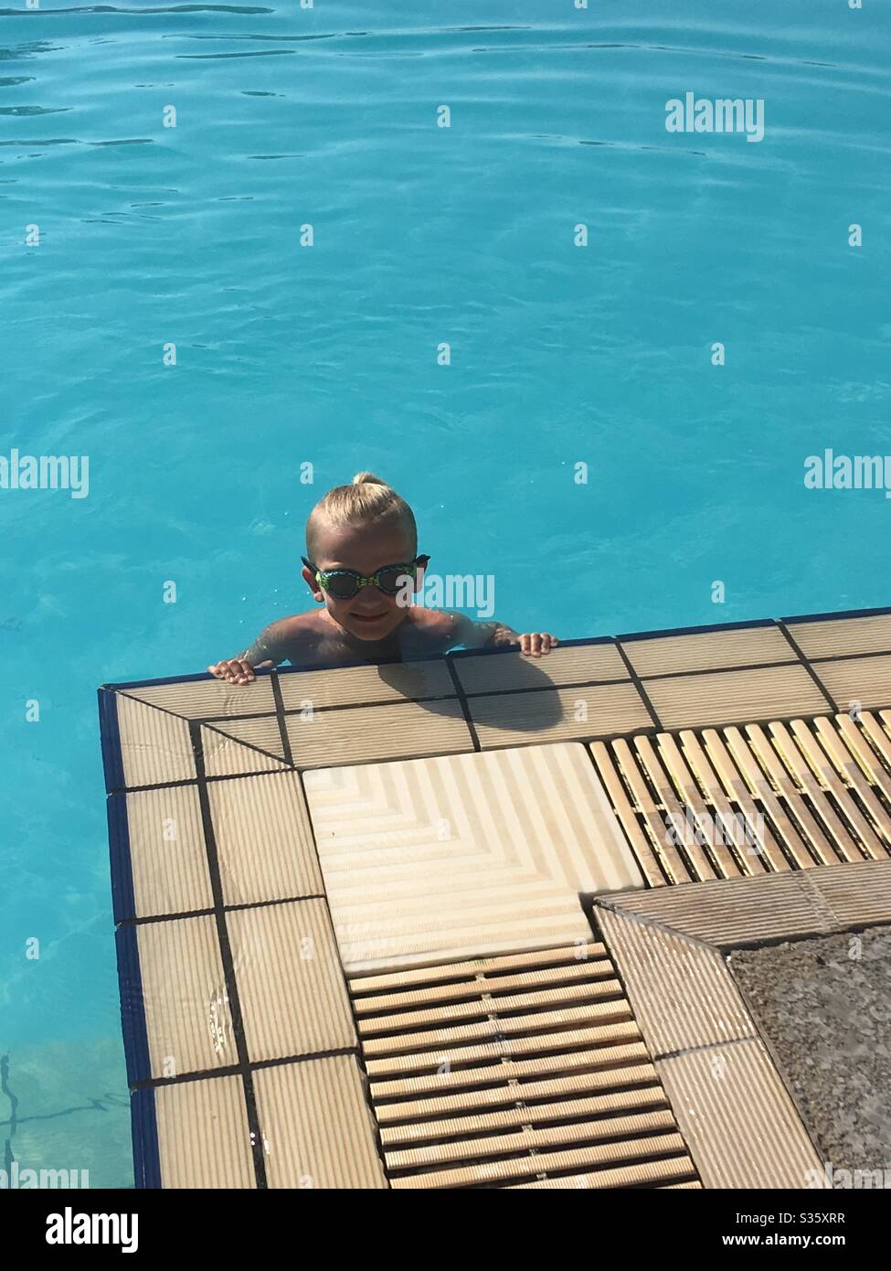 Boy in swimming pool hires stock photography and images Alamy