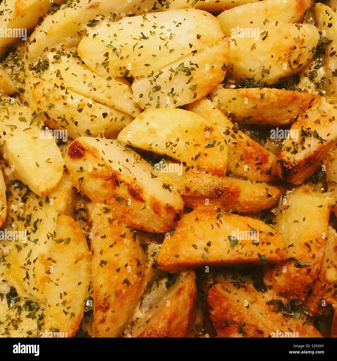 Greek Style Oven Roasted Lemon Butter Parmesan Potatoes Stock Photo Alamy