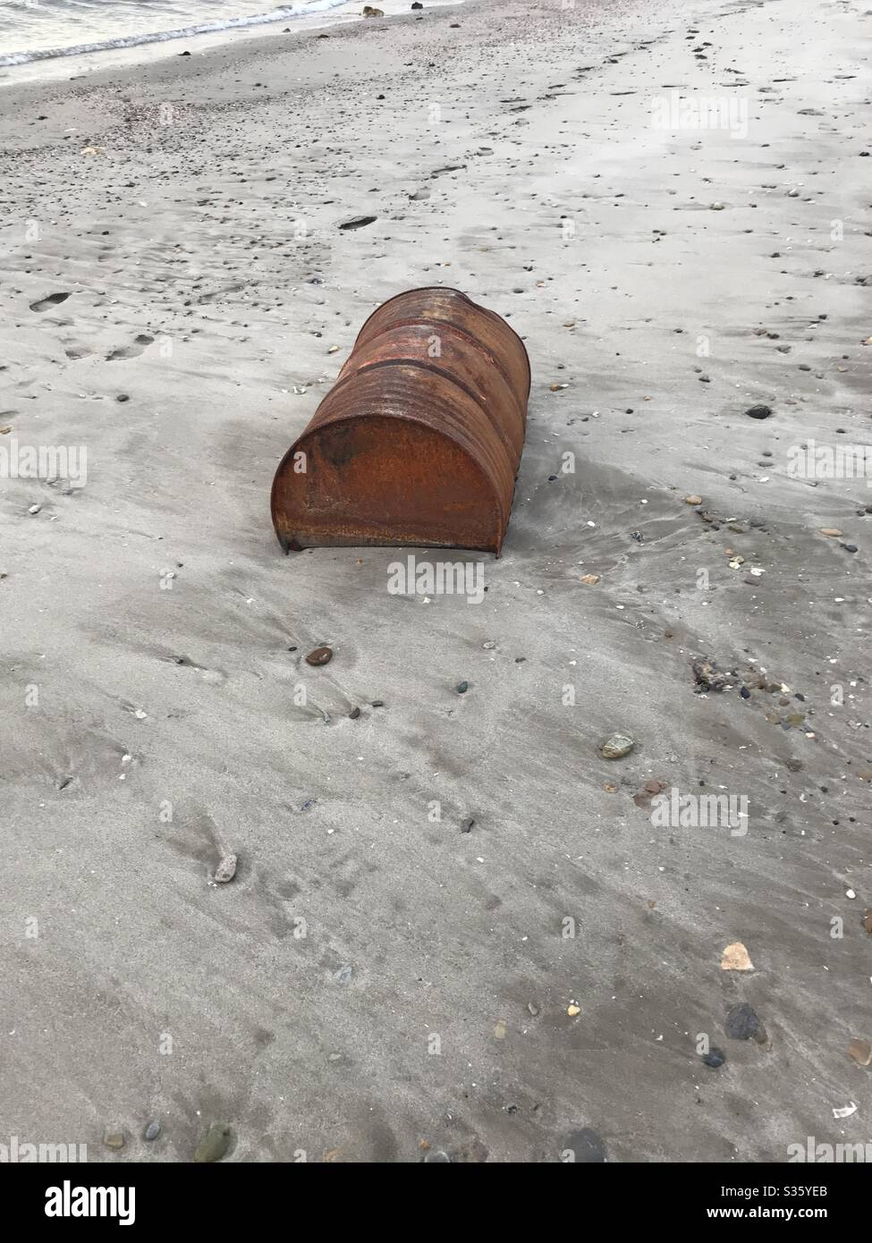 Rusted barrel on the beach - Smartphone Captured Stock Image