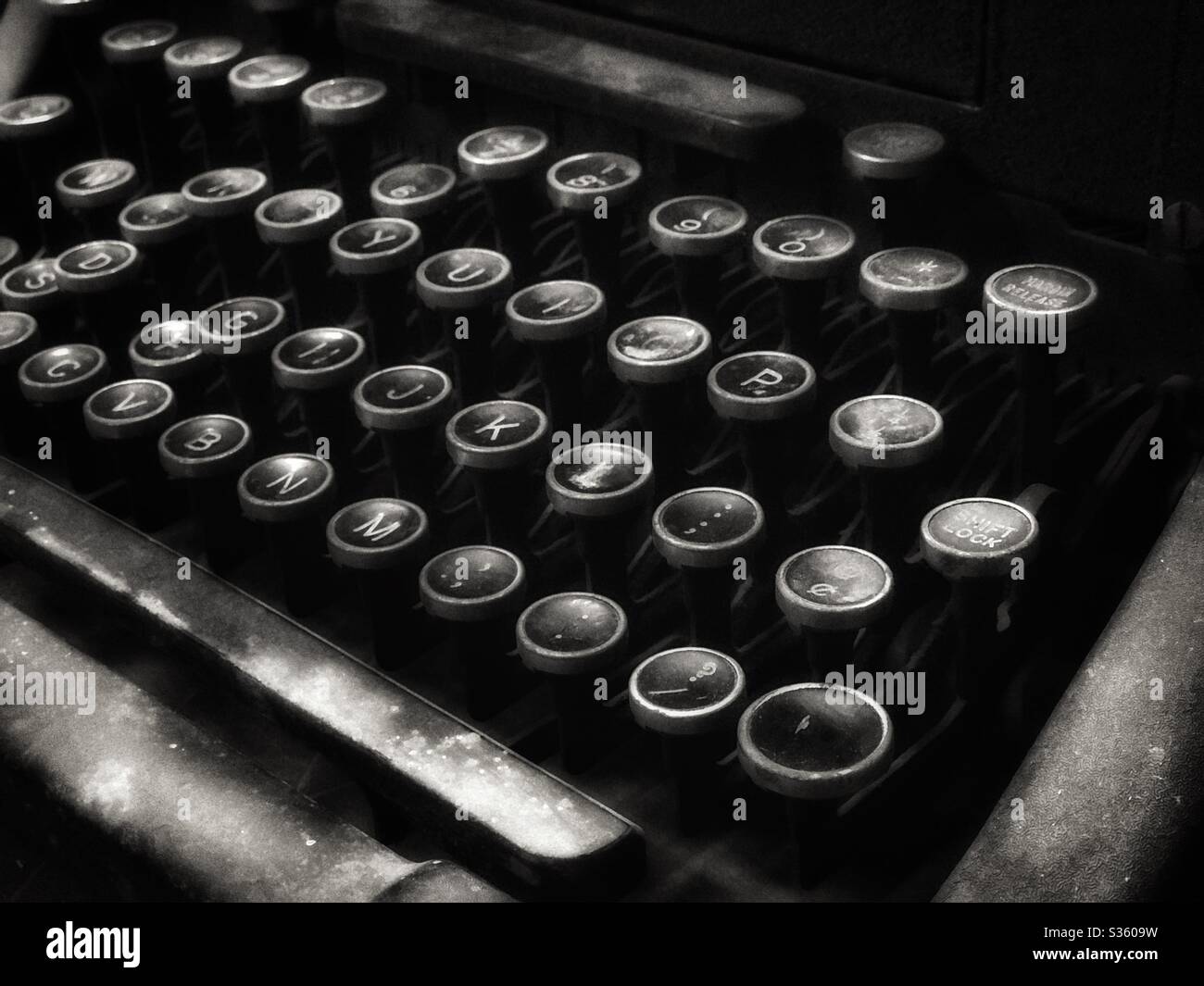 Closeup black and white image of vintage typewriter keys - Smartphone Captured Stock Image