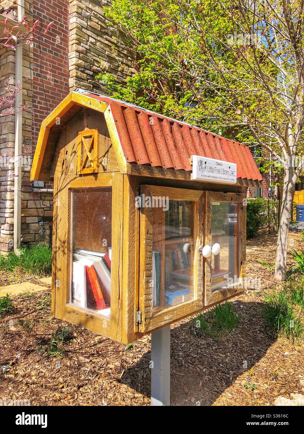 A little free library in a Toronto neighbourhood. - Smartphone Captured Stock Image