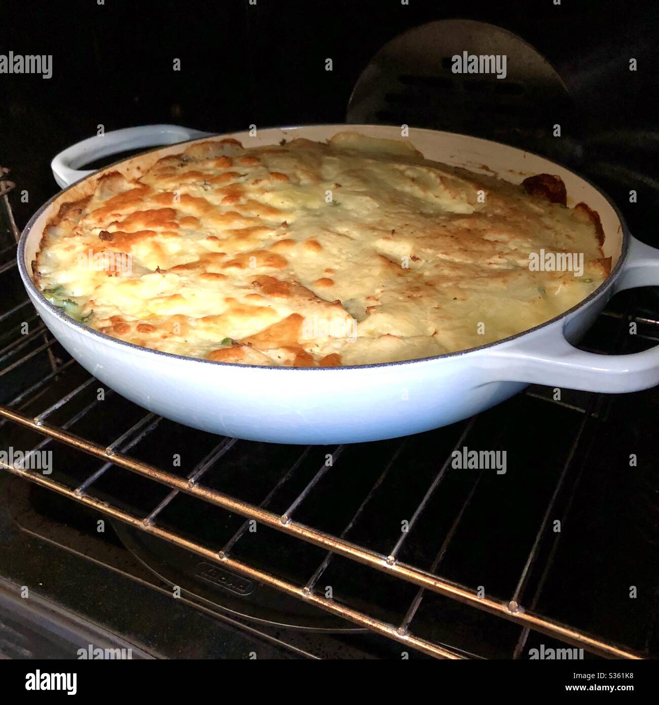 Fish Pie in the Oven Stock Photo
