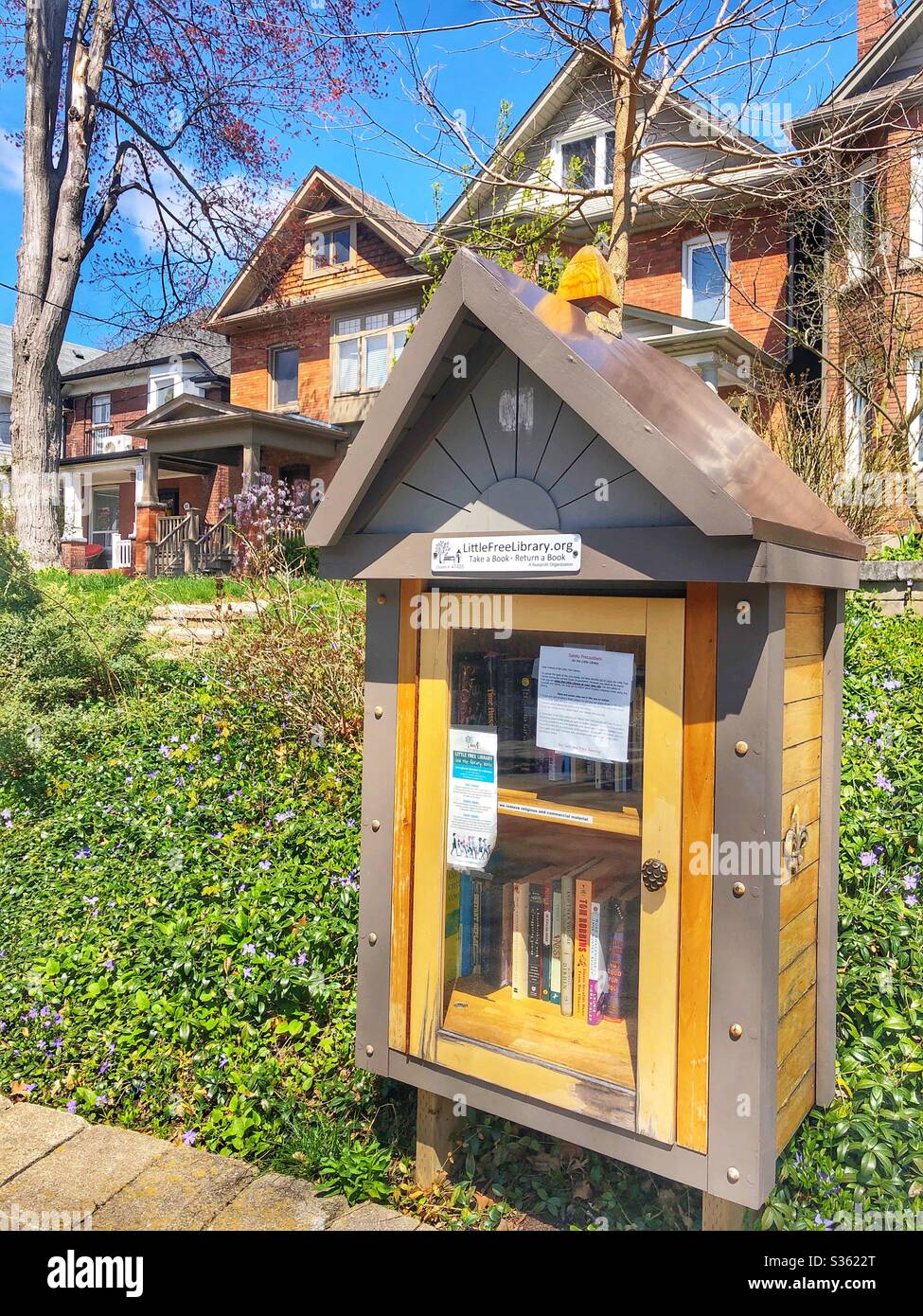 Little free library in a Toronto neighbourhood. - Smartphone Captured Stock Image
