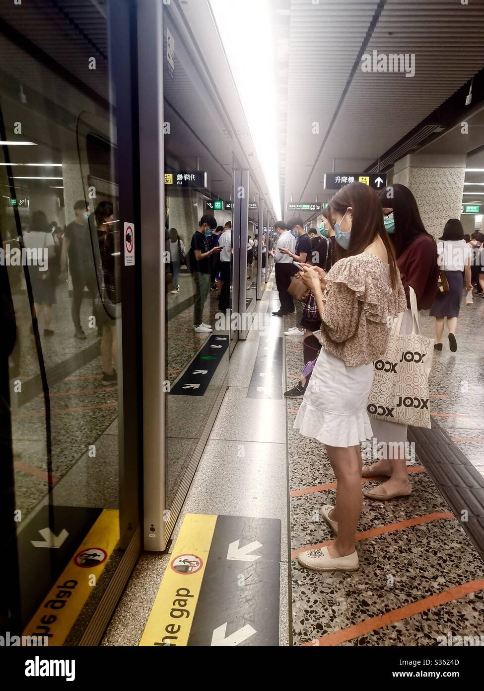 Hongkongers during the Covid-19 pandemic. - Smartphone Captured Stock Image