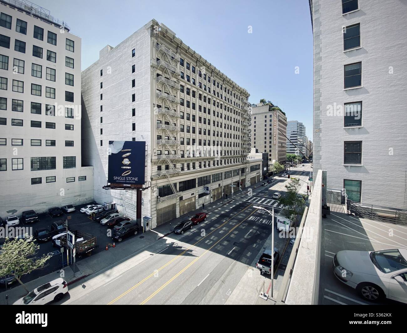 LOS ANGELES, CA, APR 2020: wide view of Hotel Clark on Hill St, in Downtown. Redesigned interior with historic facade, the building has undergone substantial renovation and is waiting to re-open. - Smartphone Captured Stock Image