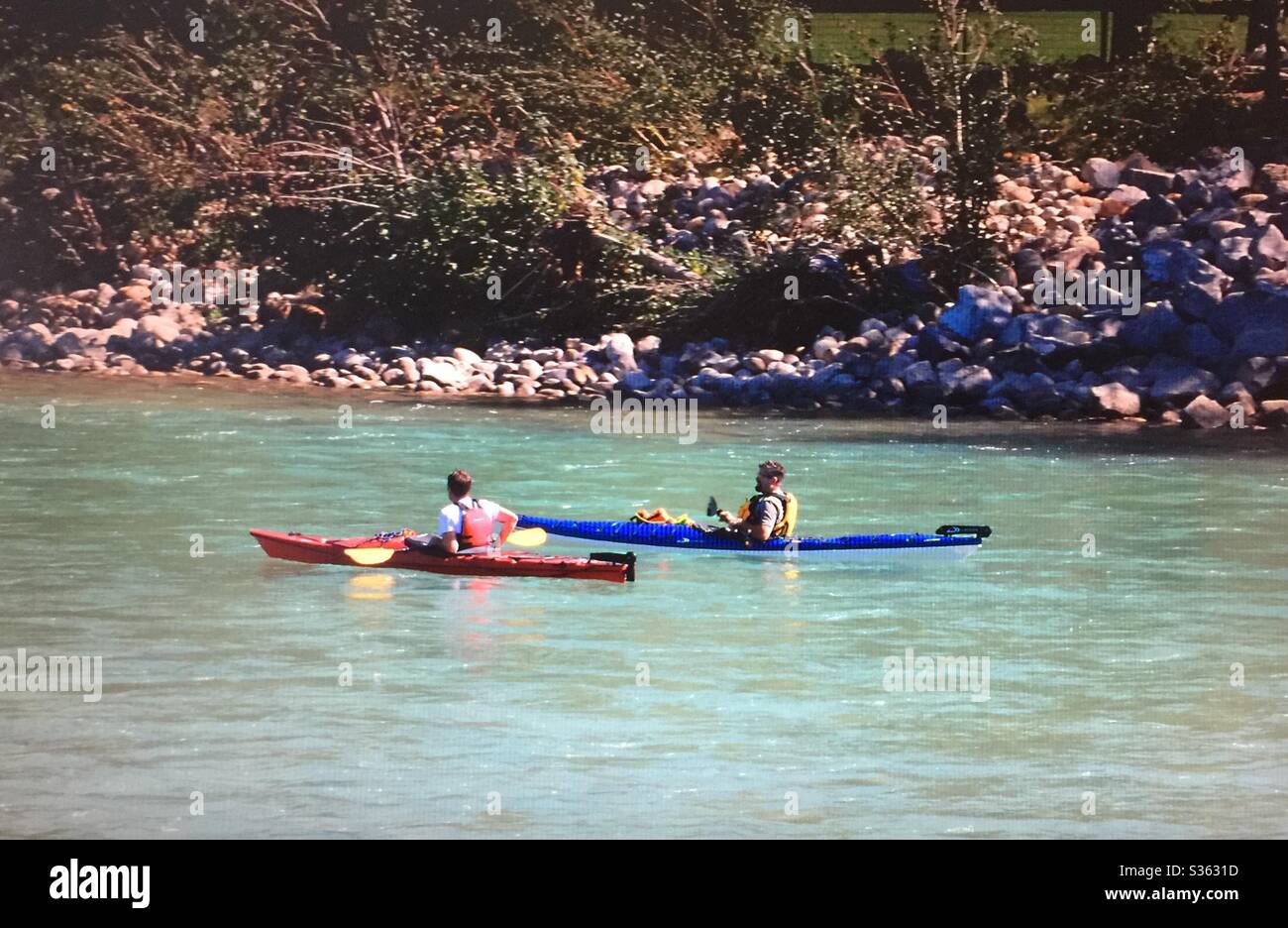 Two kayakers, Bow River, Calgary, Alberta, Canada - Smartphone Captured Stock Image