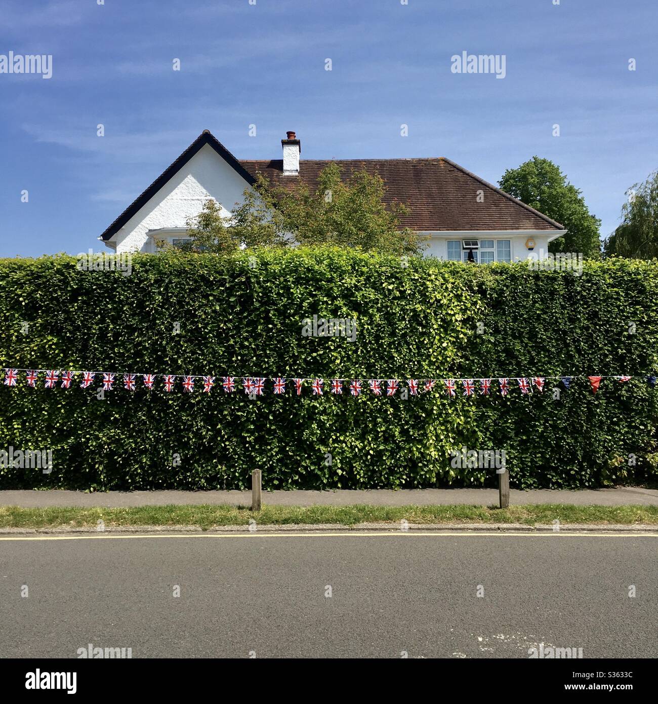 VE Day lockdown celebrations with bunting in Reigate Surrey 2020 - Victory Europe bunting celebrations England 2020 - Smartphone Captured Stock Image