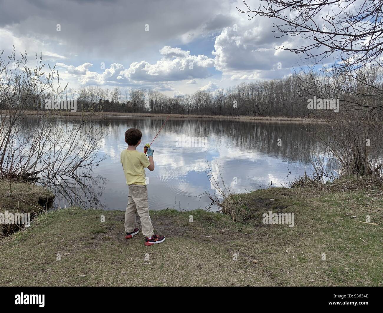 Boy fishing Stock Photo