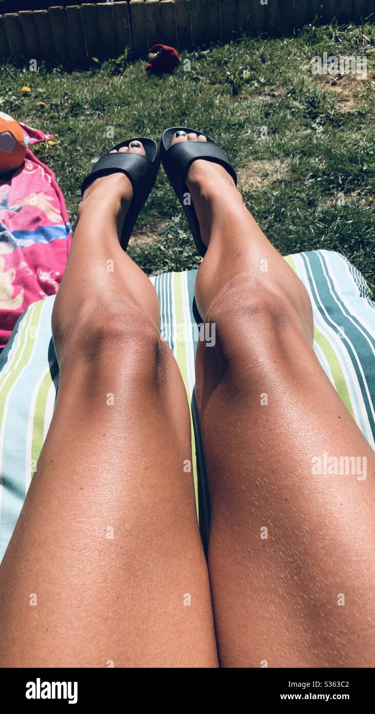 Tan legs hi-res stock photography and images - Alamy