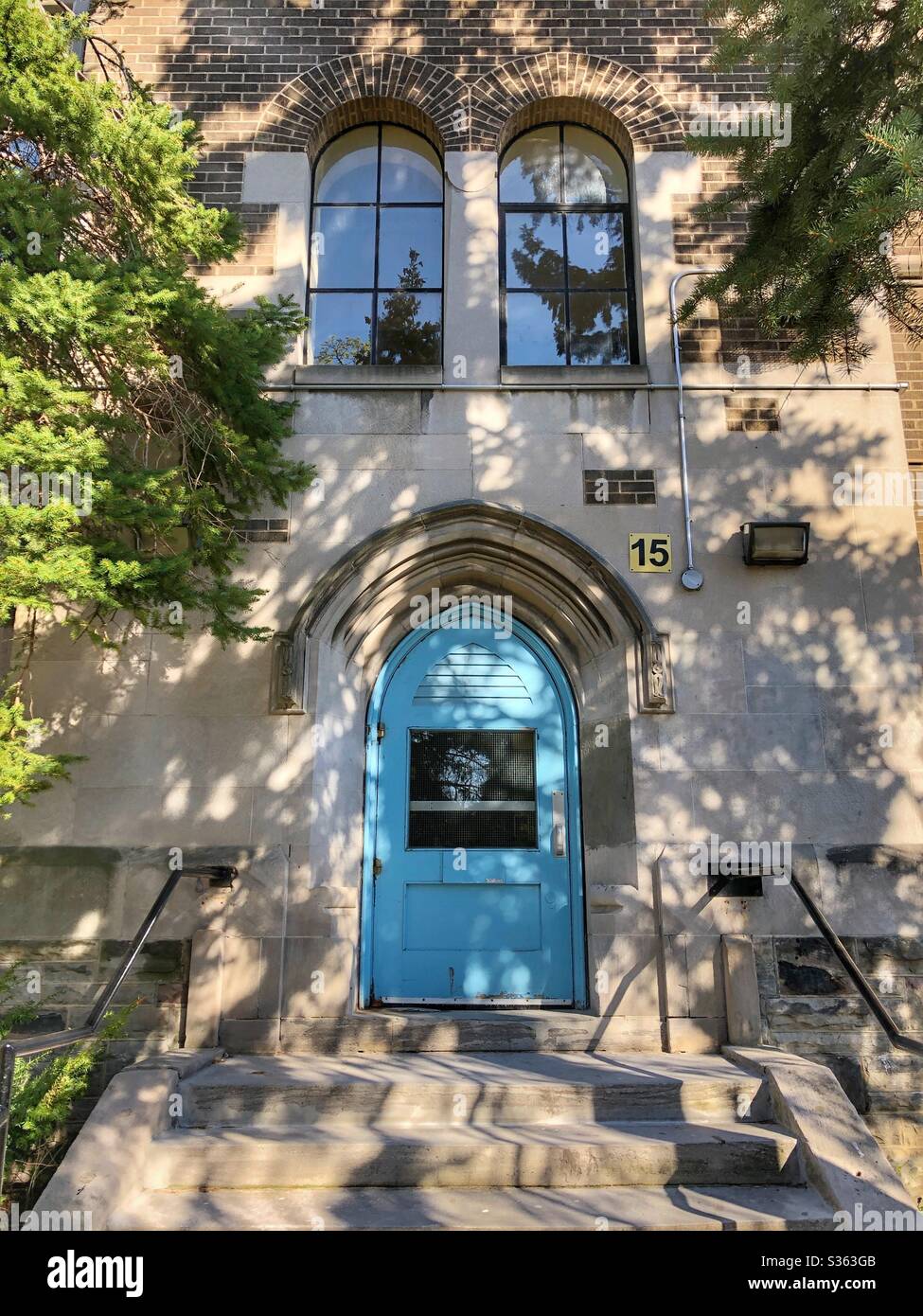 Entrance to a high school in a Toronto neighbourhood. - Smartphone Captured Stock Image