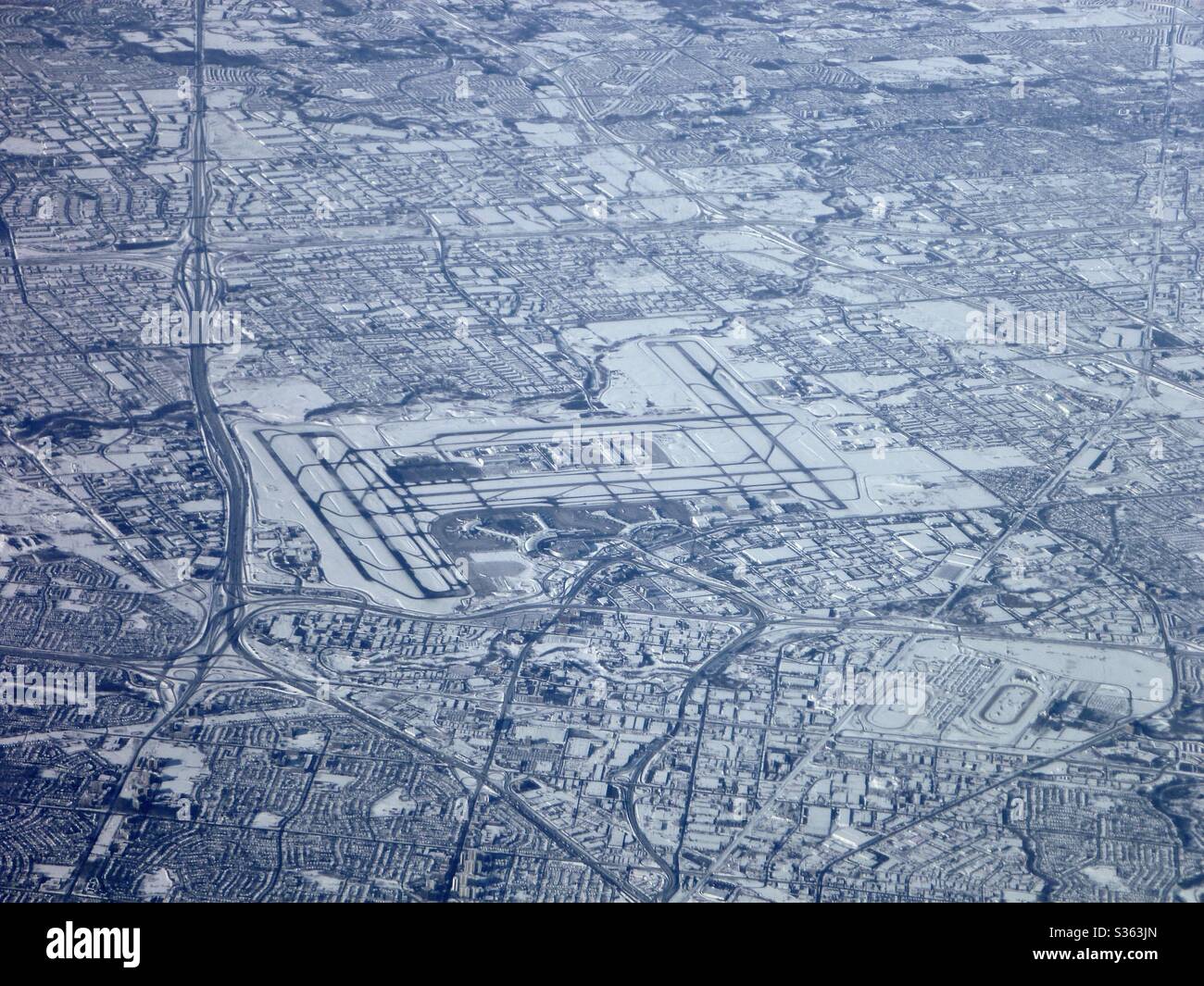 Aerial image of Toronto Airport, Ontario in the winter with snow on the ground. Stock Photo