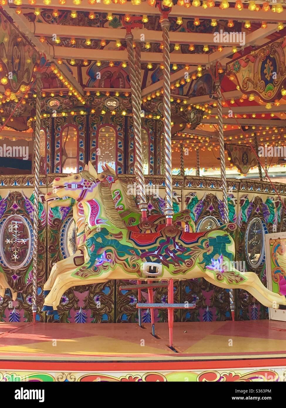 Merry-go-round on Brighton beach, UK Stock Photo