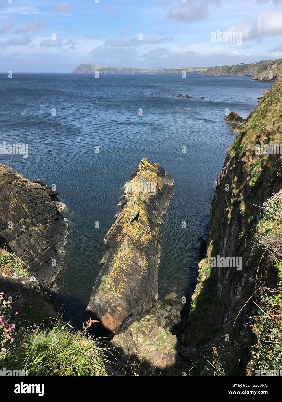 Cliff formations looking out to sea Stock Photo