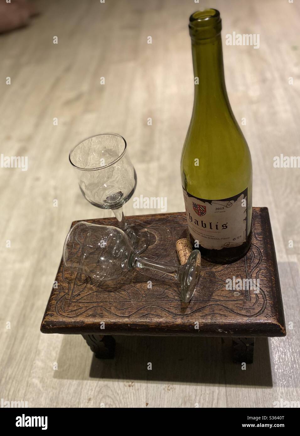 March 2020 - Wine bottle and two glasses - Smartphone Captured Stock Image
