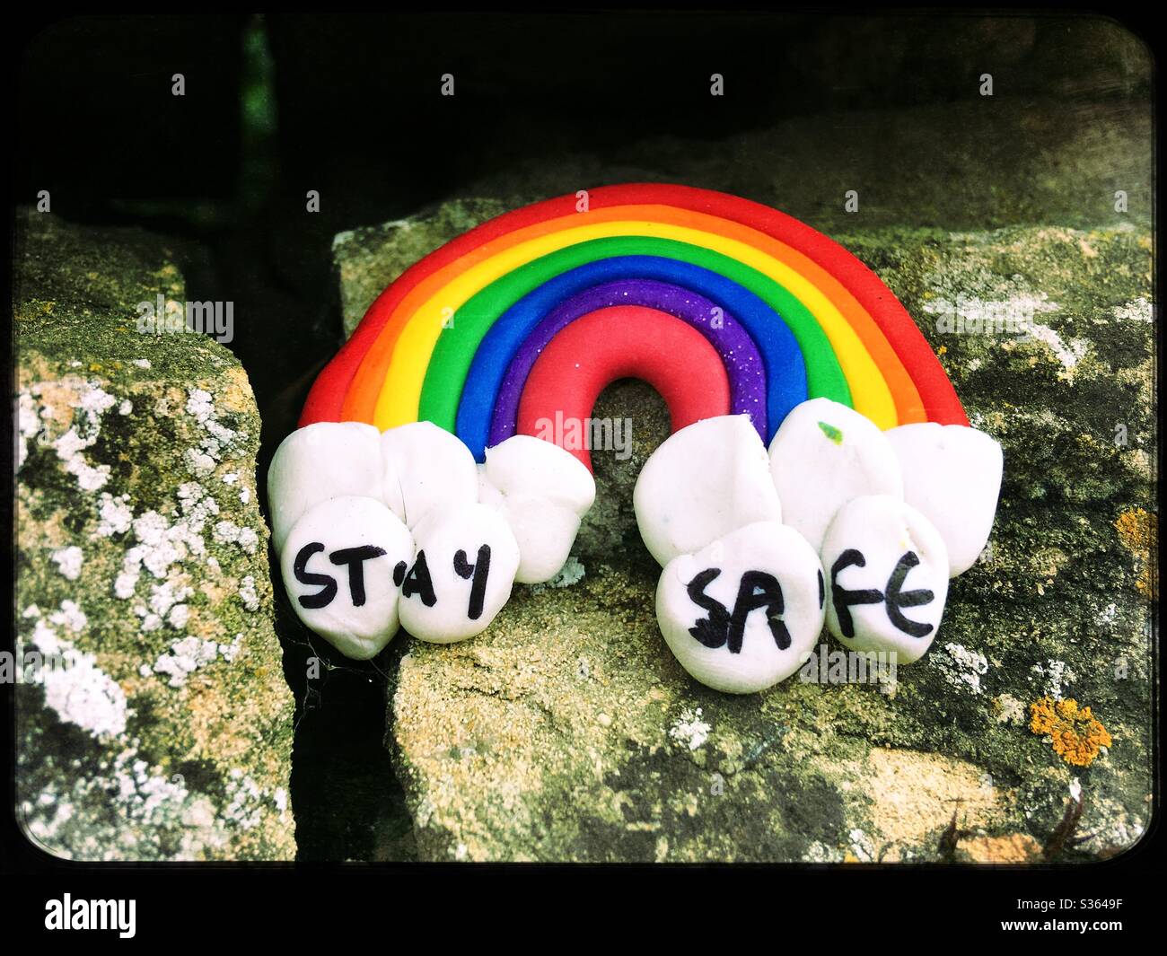 Homemade message of goodwill left on village stone wall during a Covid pandemic lockdown. Lincolnshire, UK. - Smartphone Captured Stock Image