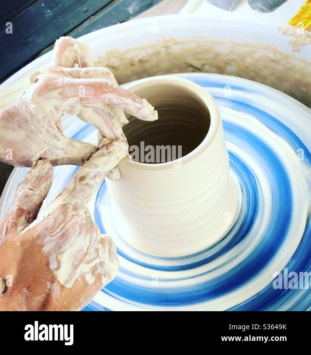 Pottery wheel making cups Stock Photo Alamy