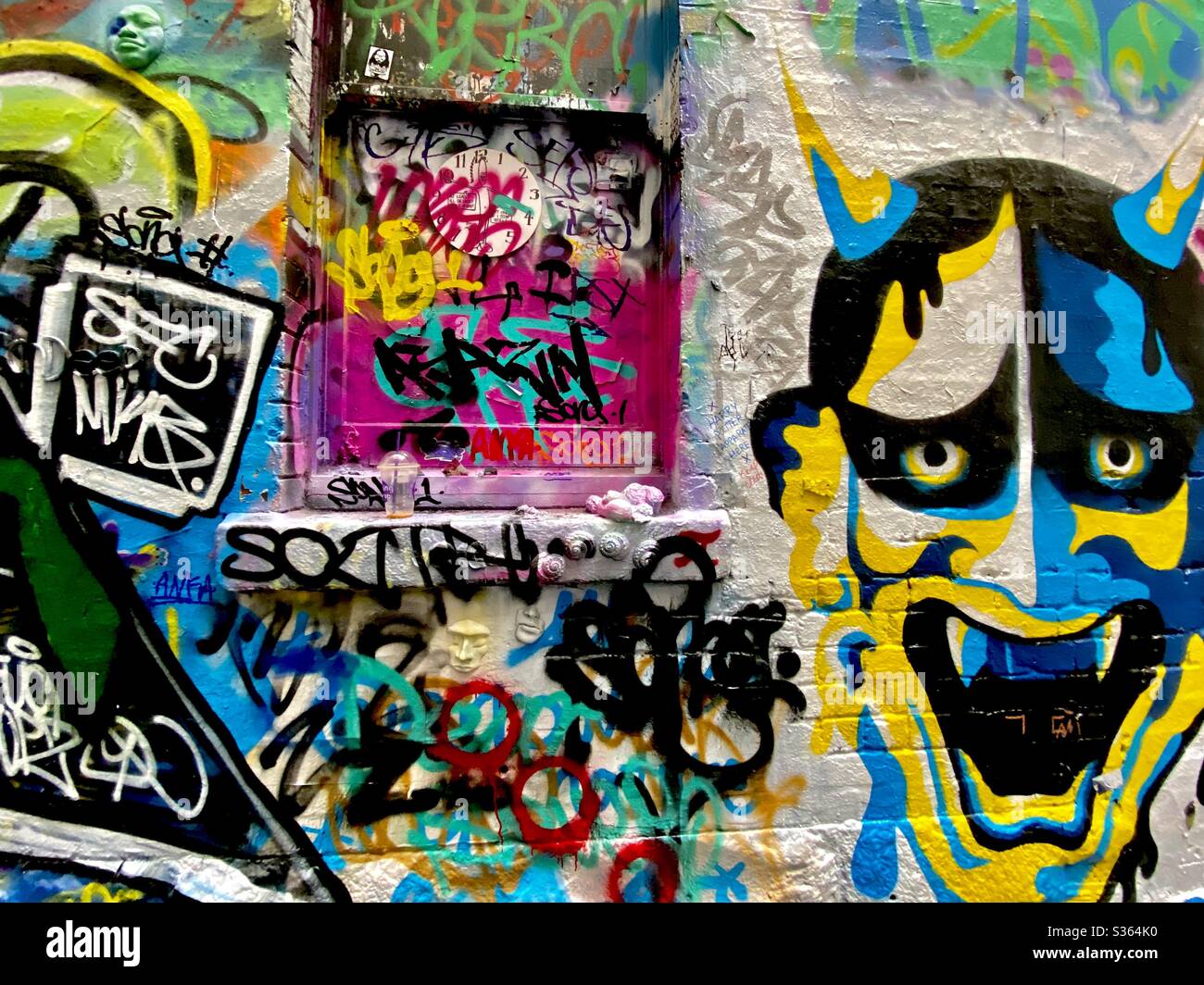 Graffiti and stencil art in the iconic Hosier Lane in Melbourne, Australia - Smartphone Captured Stock Image