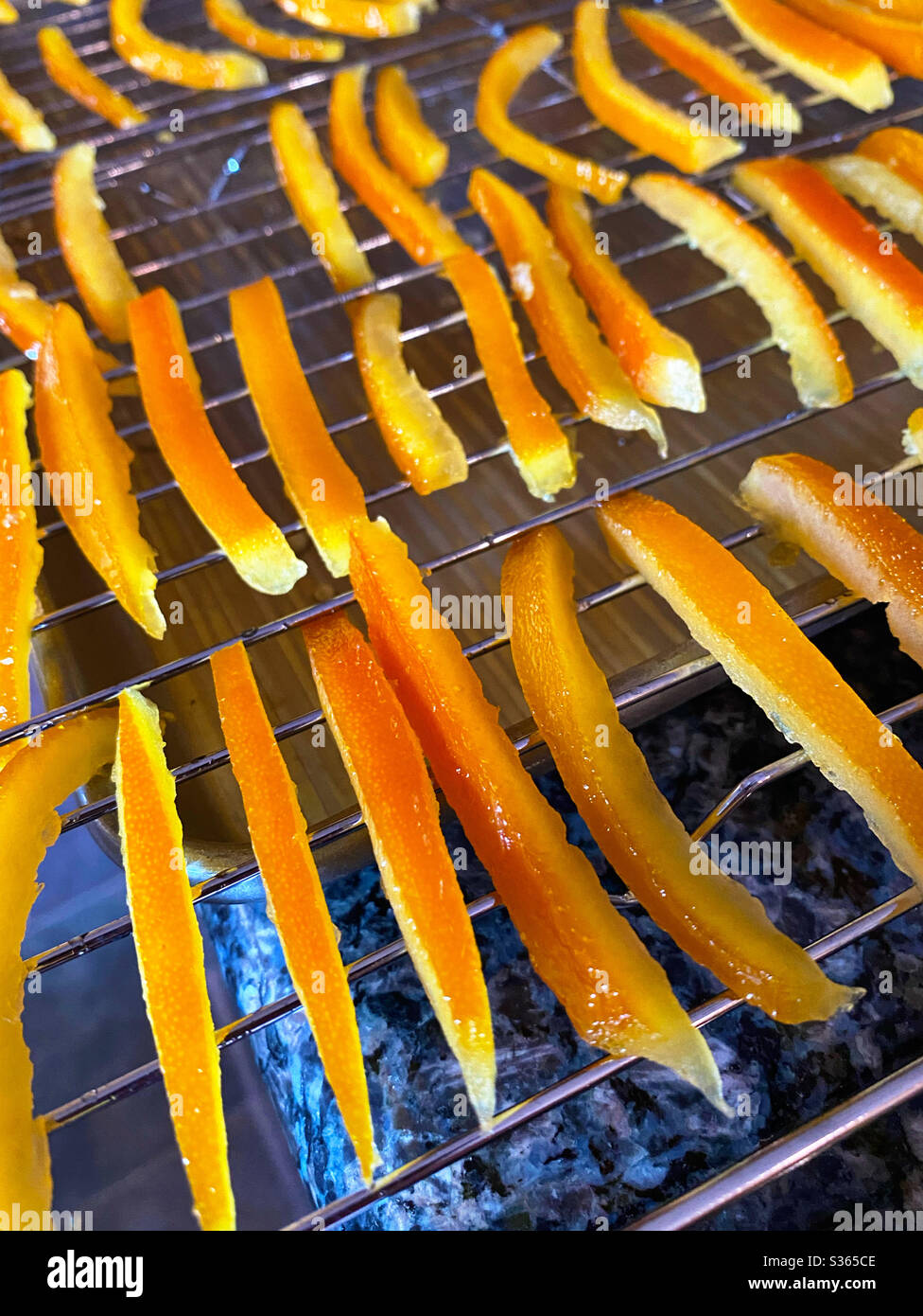 Candied orange peels on cooling rack - Smartphone Captured Stock Image