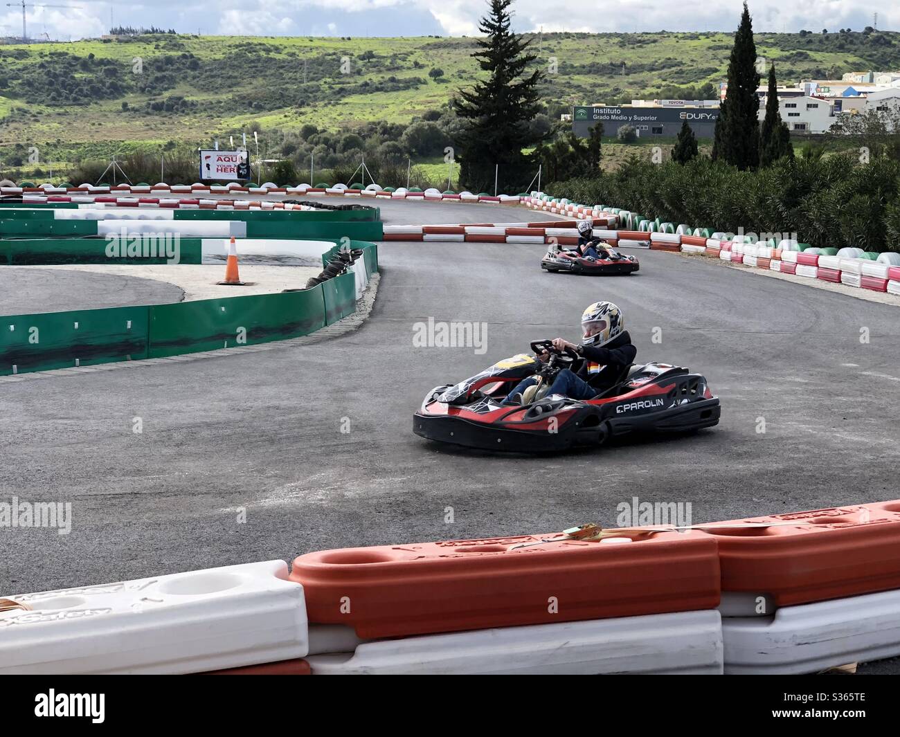 Family day out at the Go Kart track Stock Photo - Alamy