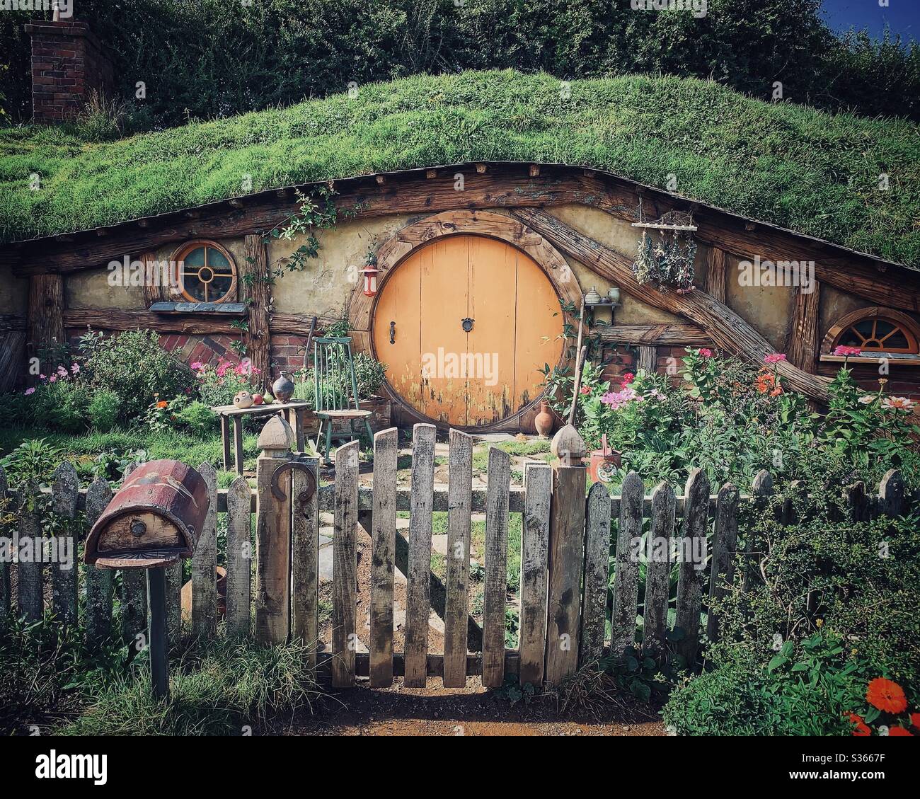 Hobbiton. Bucolic place in New Zealand where the hobbits from the Middle Earth live. Lord of the rings movie set. Stock Photo