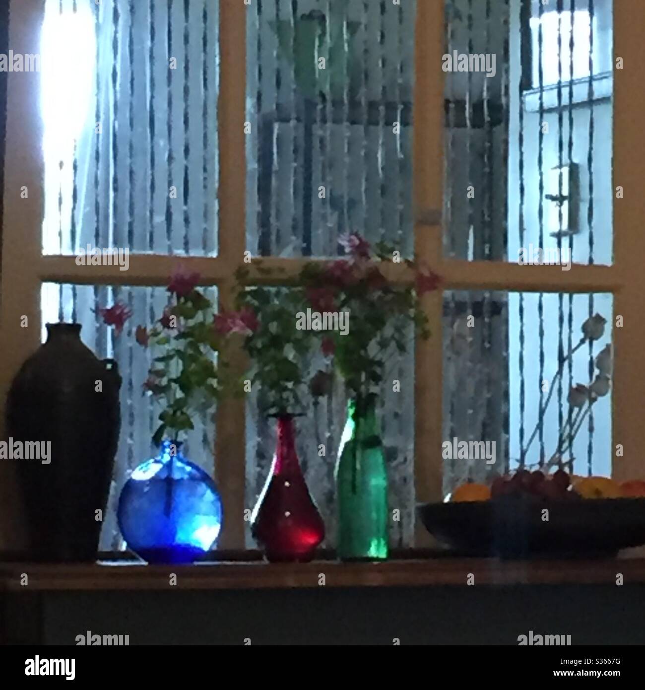 Coloured glass bottles hires stock photography and images Alamy