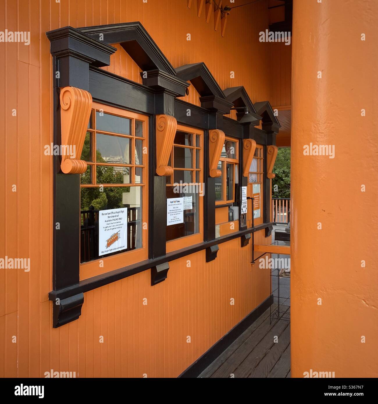 LOS ANGELES, CA, APR 2020: bright orange and black ticket office windows at  Angel's Flight funicular railway station in Downtown - Smartphone Captured Stock Image