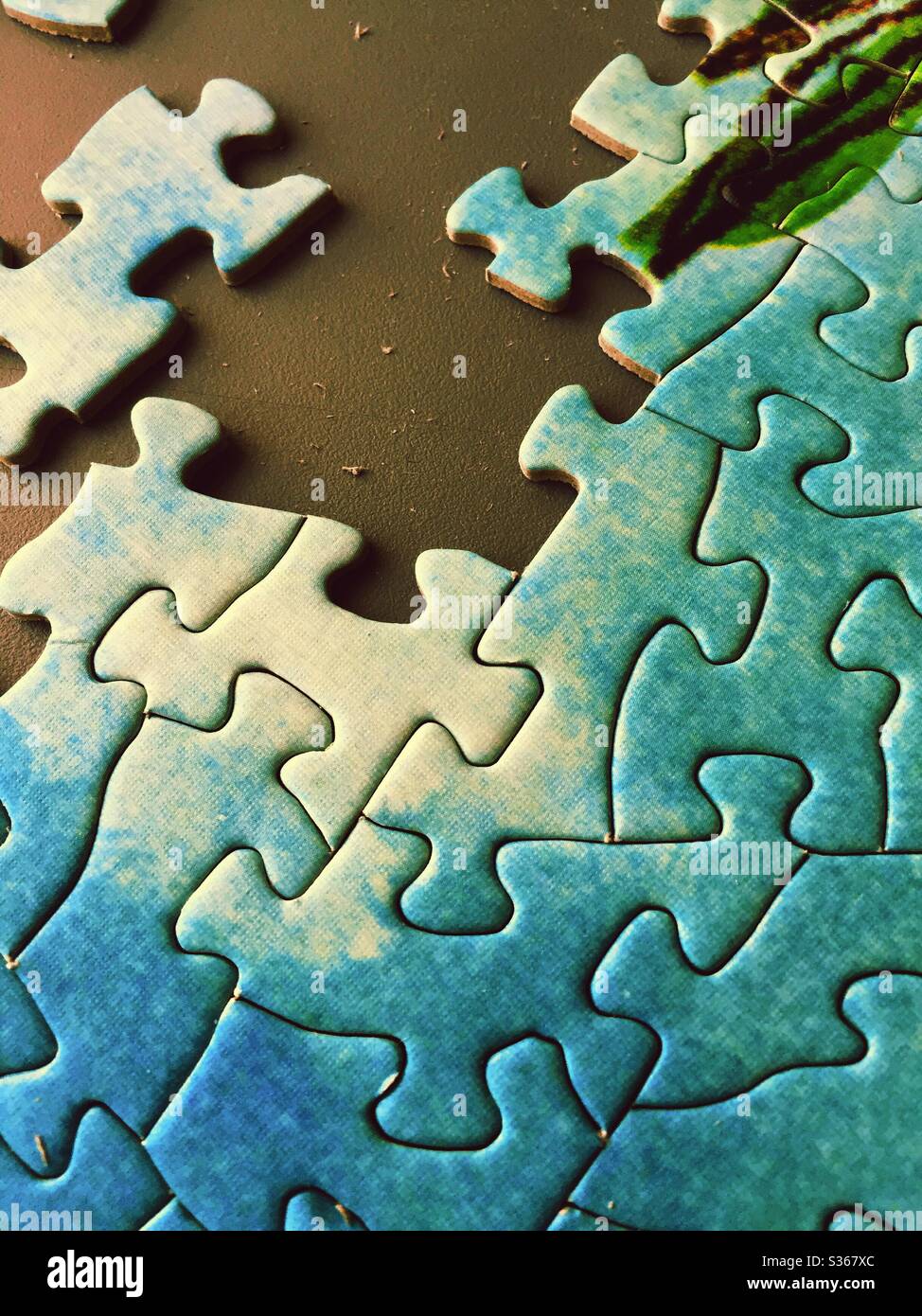 Jigsaw puzzle in progress of being assembled Stock Photo Alamy