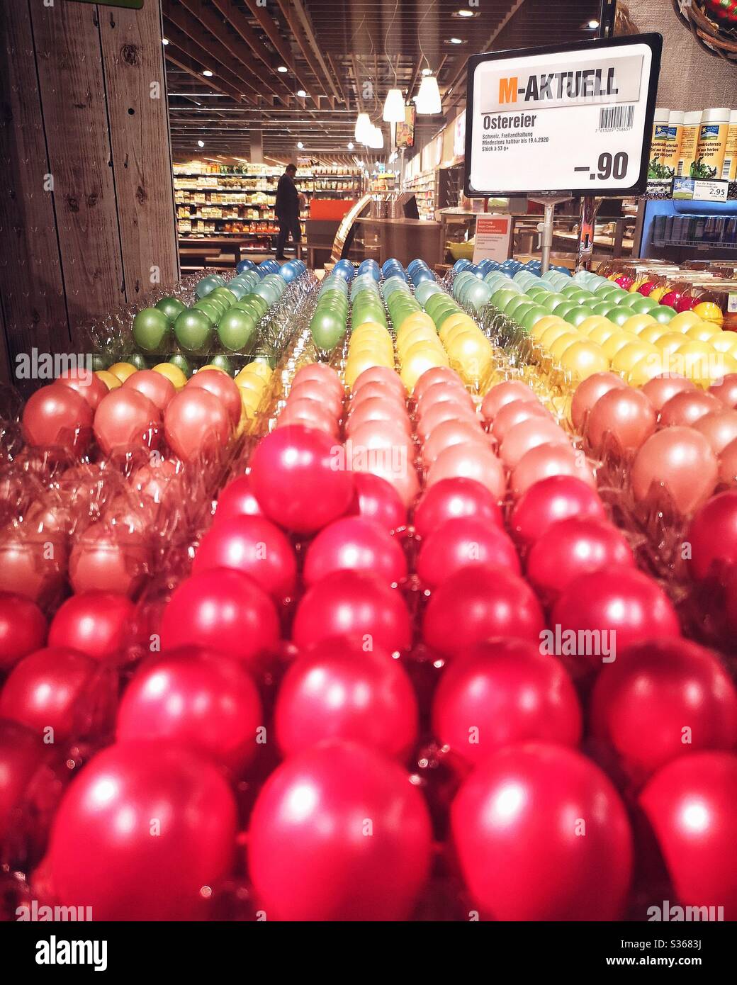 Colored Easter eggs in a Swiss supermarket Stock Photo