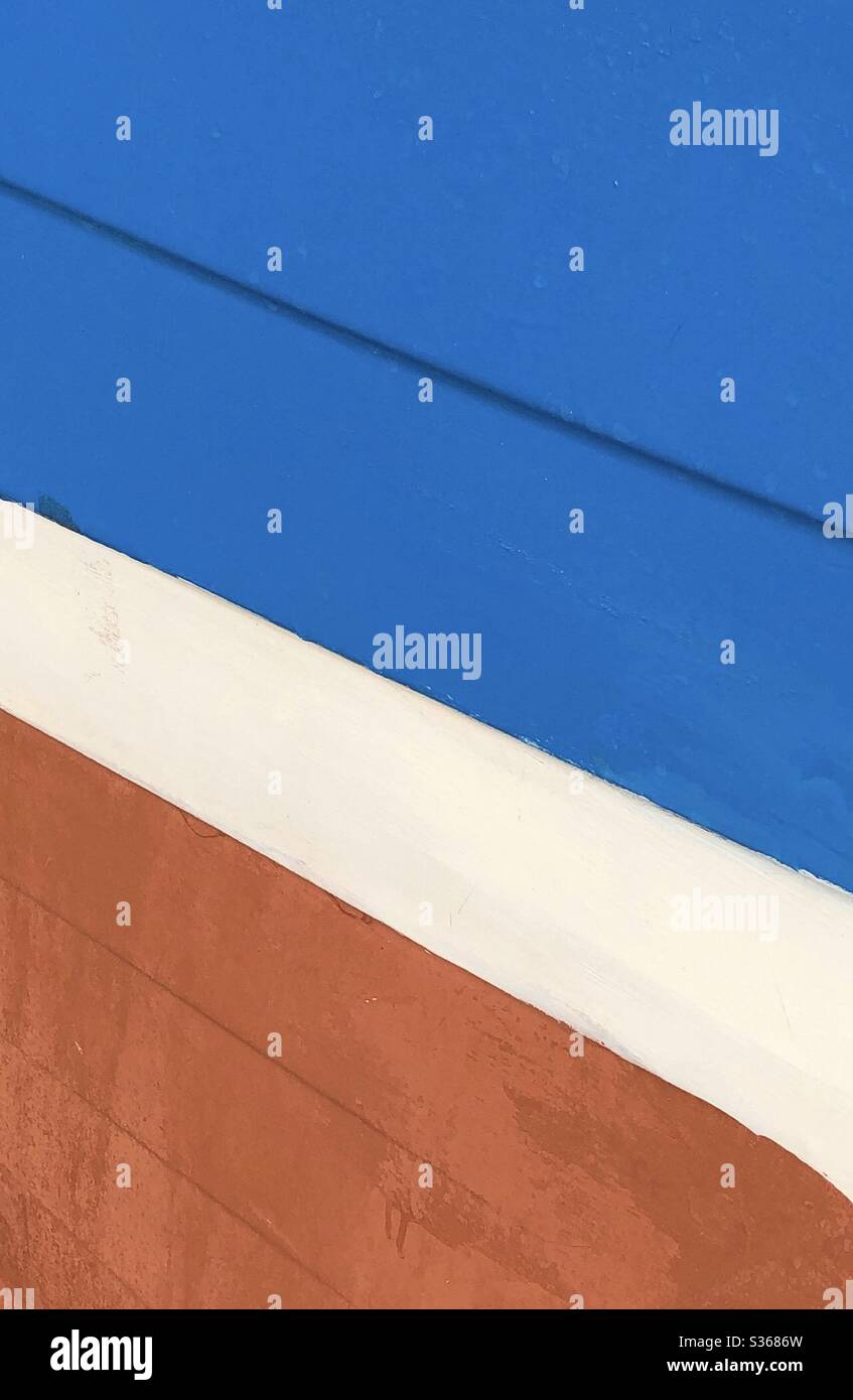 Abstract lines and blocks of colour formed by the wooden panels of a boat Stock Photo