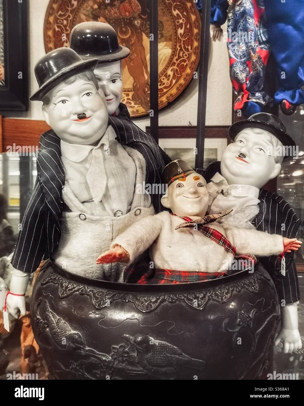 Laurel and Hardy dolls in antique shop - Smartphone Captured Stock Image