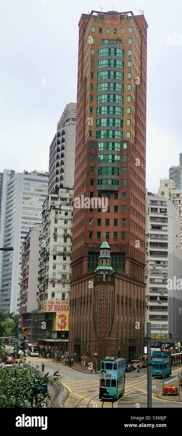 Trams by the Chinese Methodist church in Wan Chai, Hong Kong. - Smartphone Captured Stock Image
