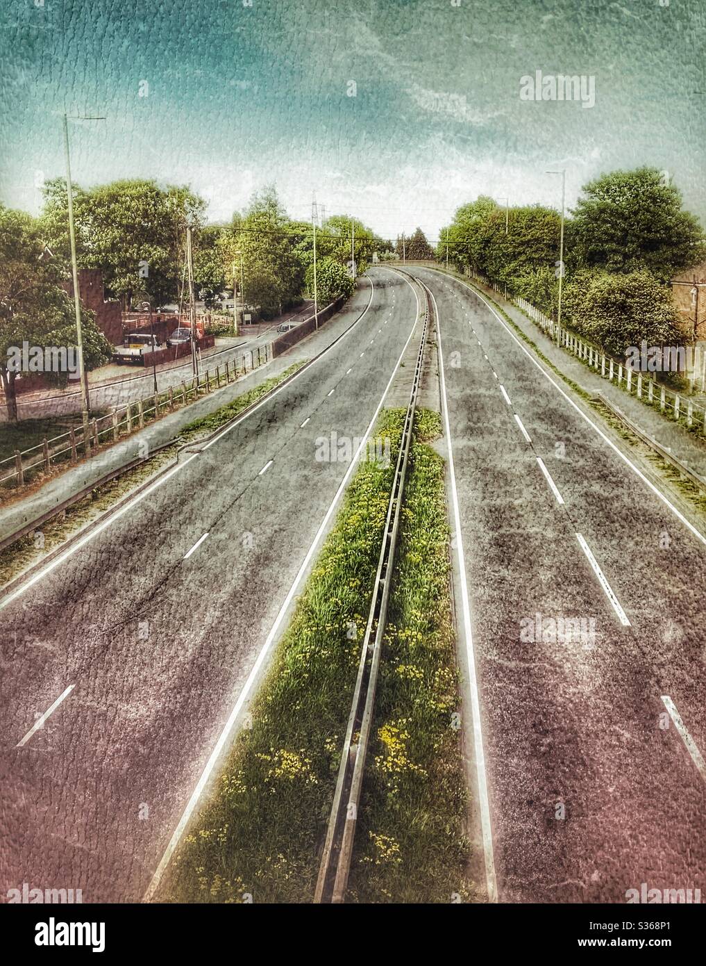 Empty main road during CV-19 lockdown - Smartphone Captured Stock Image