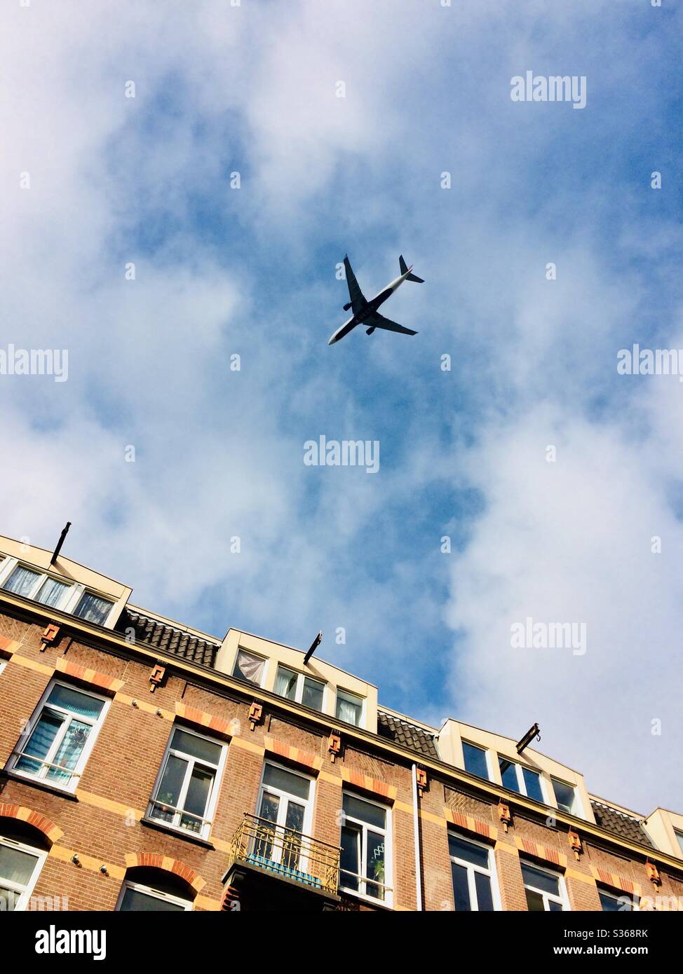 The plane is traveling. Amsterdam, The Netherlands. Stock Photo