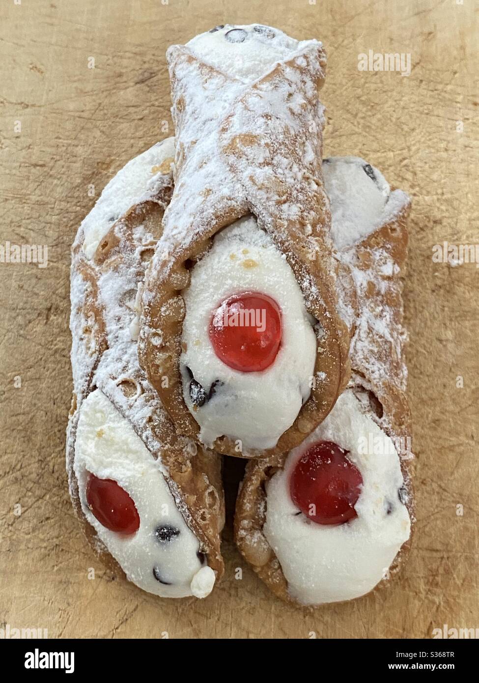Traditional Sicilian Cannoli, typical italian dessert with ricotta cheese Stock Photo