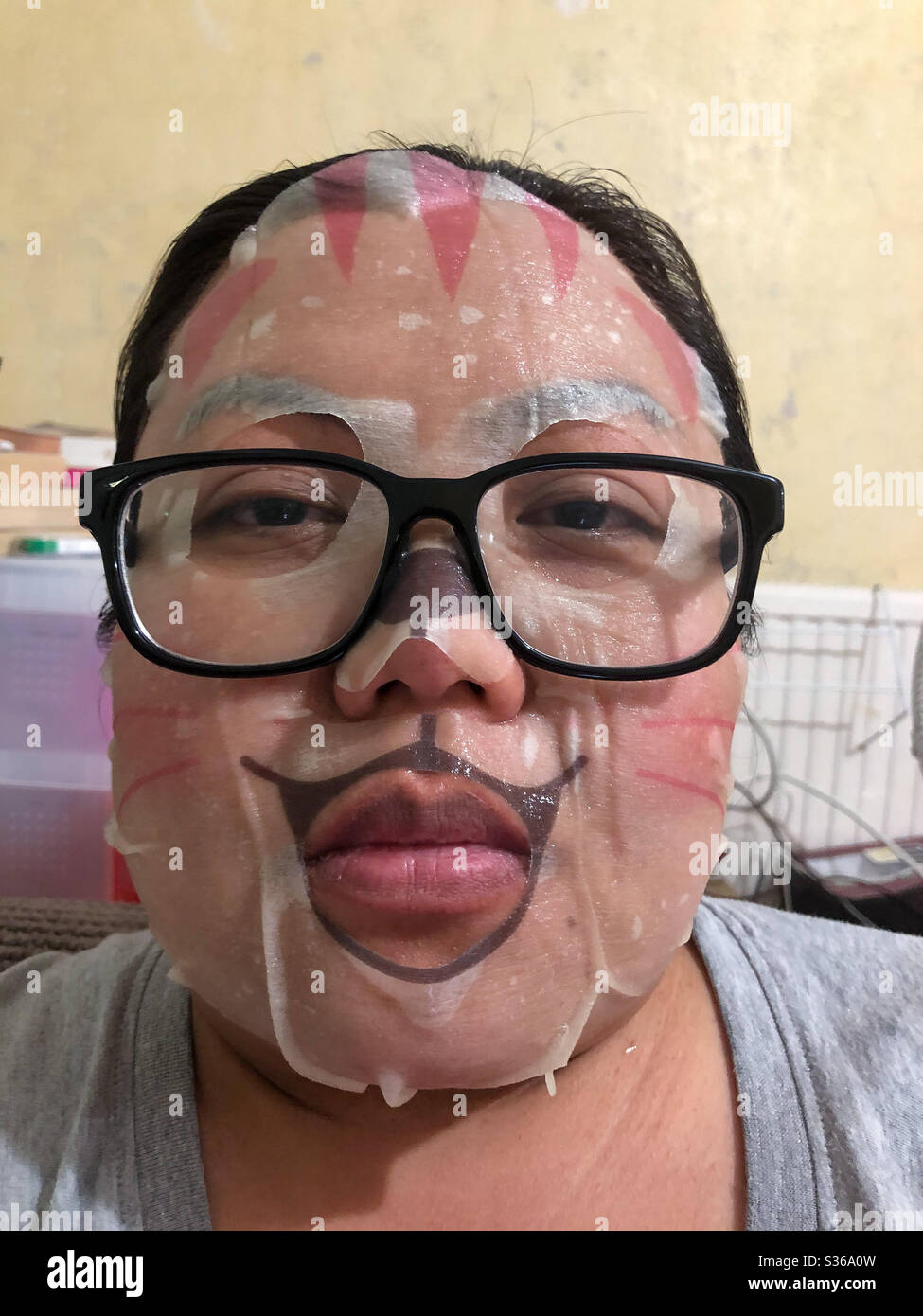 Portrait of a lady wearing a moisturising face mask. Stock Photo