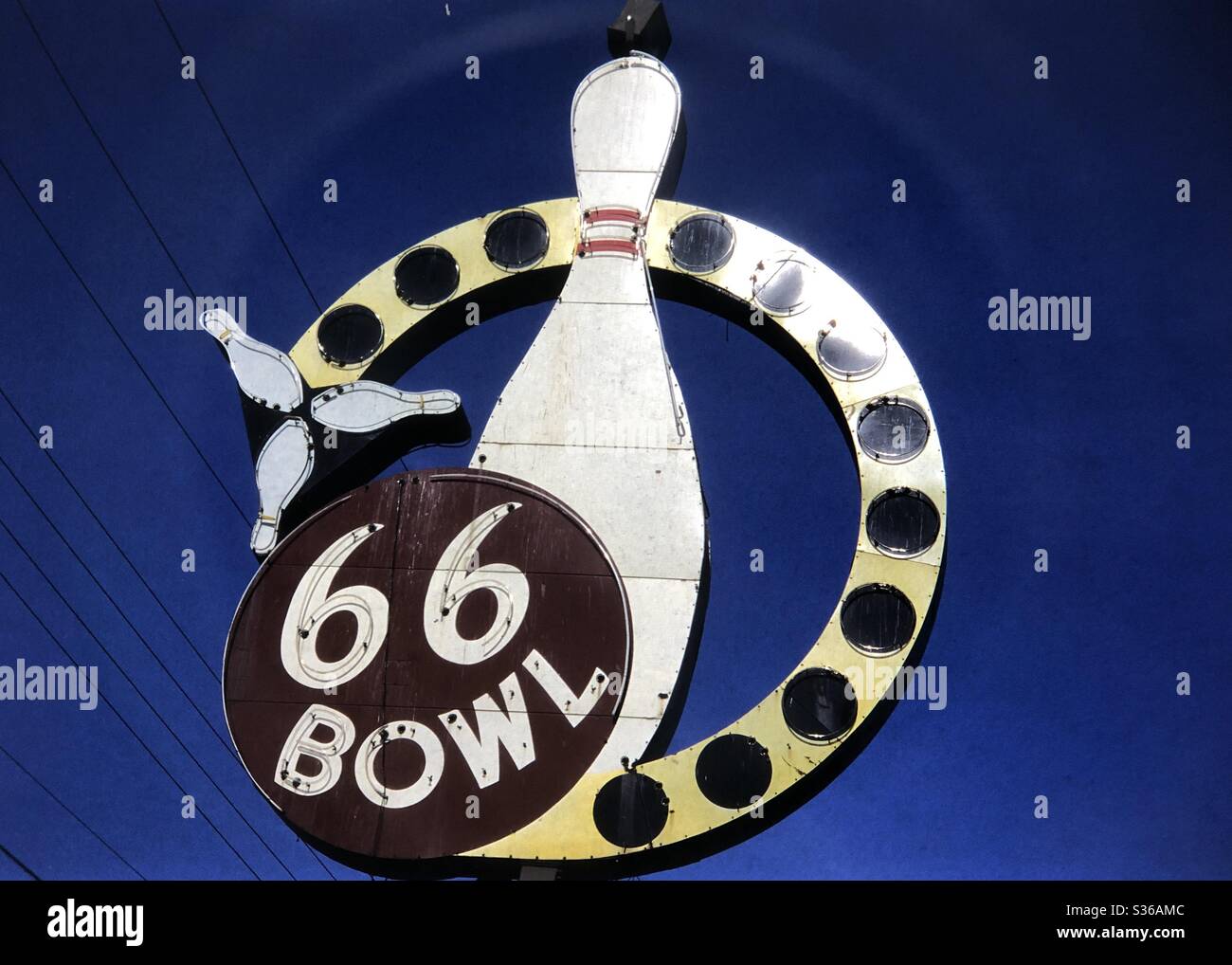 Bowling Alley sign Route 66 Missouri bright blue sky graphic design Stock Photo
