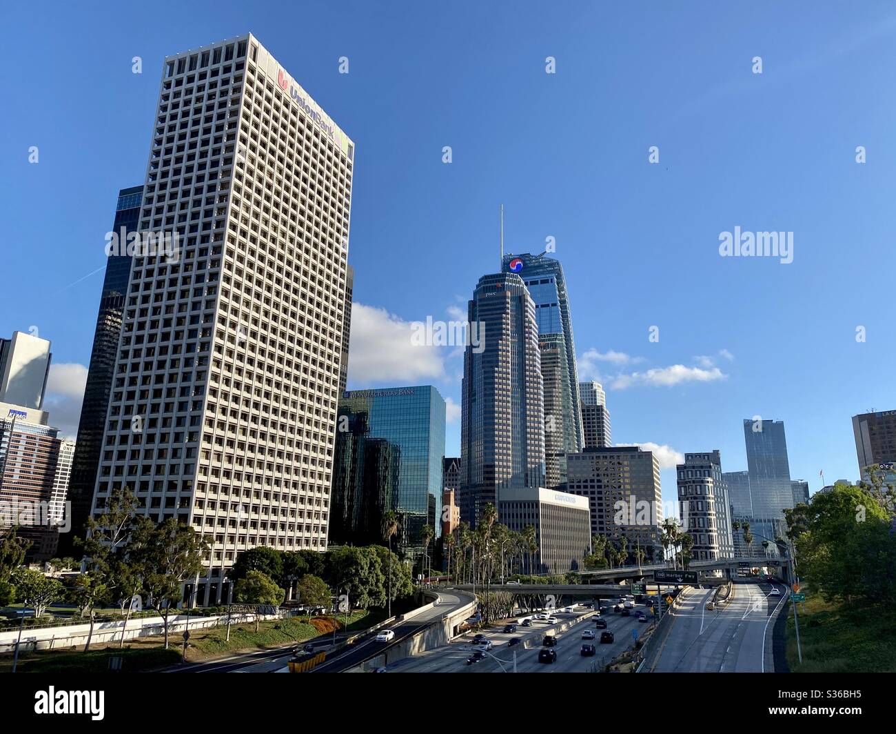 LOS ANGELES, CA, MAY 2020: Downtown, looking south across the CA-110 freeway, with Union Bank Tower on left, other skyscrapers, hotels, banks, and office buildings in background - Smartphone Captured Stock Image