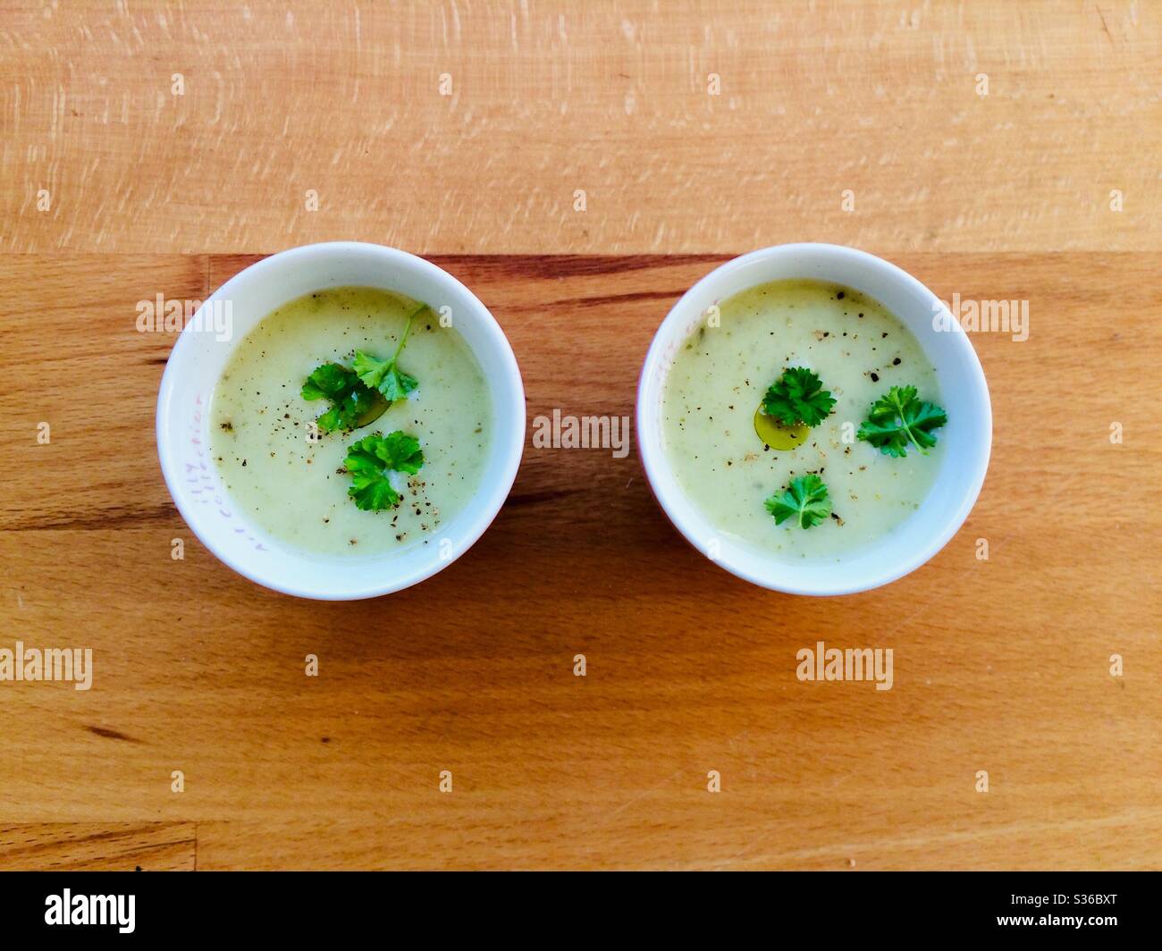 Nice cold broccoli soup shots. Stock Photo