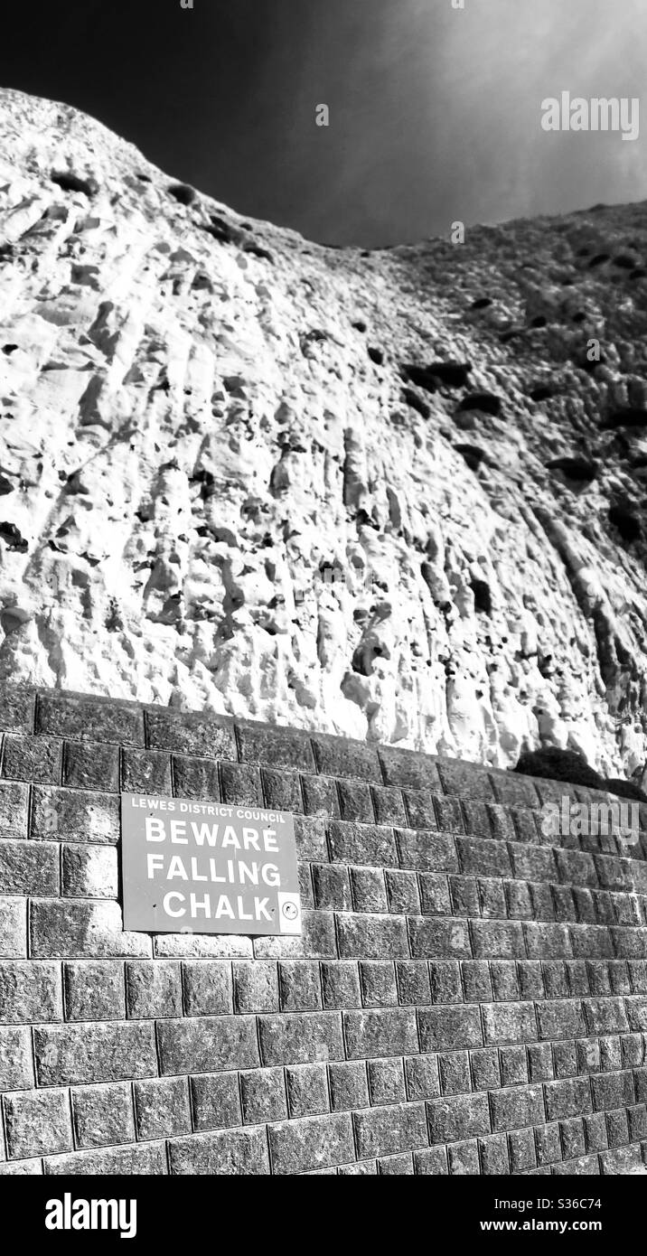 Lewes district council ‘beware falling chalk’ sign near Peacehaven, UK. Stock Photo