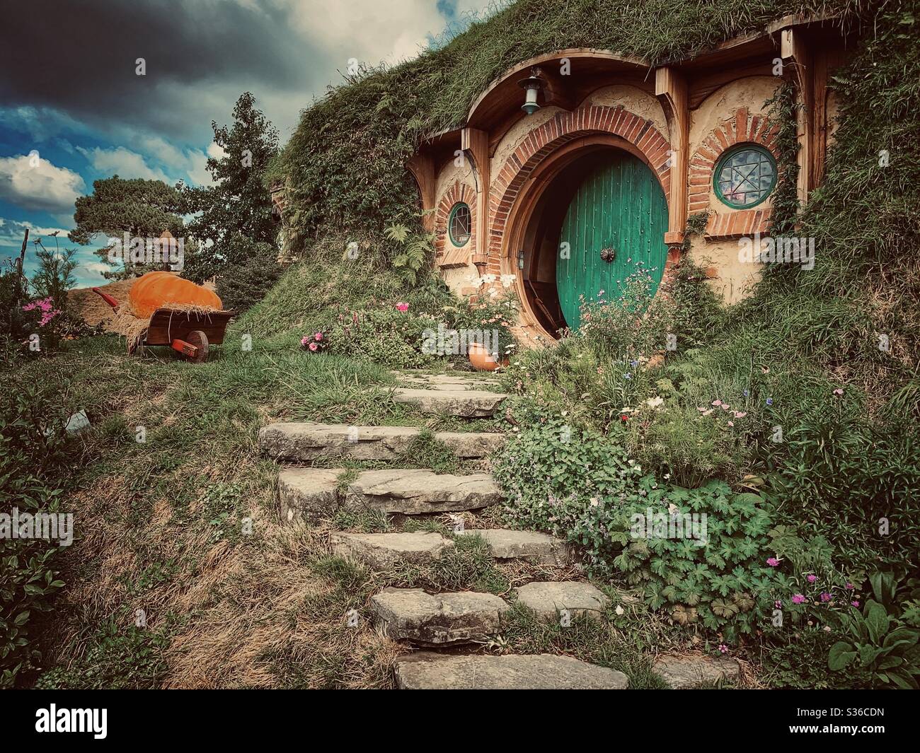 Hobbiton. Bucolic place in New Zealand where the hobbits from the Middle Earth live. Lord of the rings movie set. Stock Photo