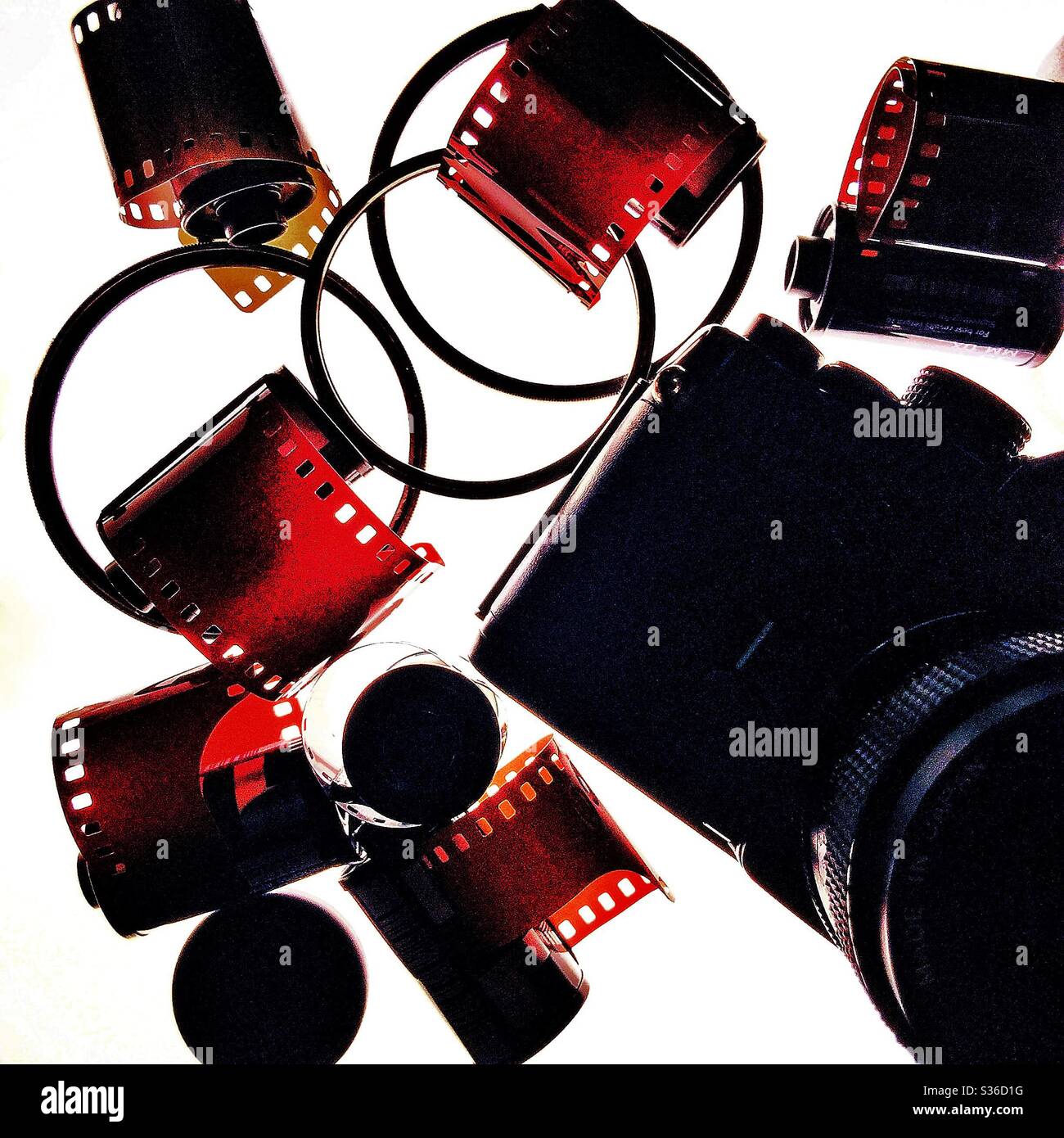 Analogue film camera and film and filters. - Smartphone Captured Stock Image